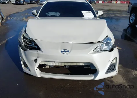 2014 Scion Fr-S z USA, uszkodzony, nr VIN JF1ZNAA14E9703129
